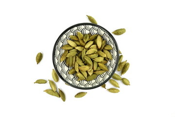 Wall Mural - Pile of cardamom or cardamon seeds spice isolated on white background. Dried cardamom seeds isolated on white