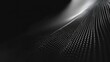 © Last - Abstract grayscale wave of light dots on dark background.