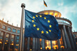 © olvius - EU flag against the background of the Parliament building