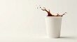 © yut - A splash of dark coffee into a plain white disposable cup