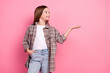© deagreez - Delightful young girl in trendy casual outfit posing with a pink background full of radiance and joy