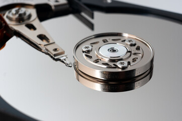 Wall Mural - Close-up of the mechanism and assembly of a computer hard drive