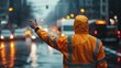 © เลิศลักษณ์ ทิพชัย - Security guard directing traffic on a rainy day, wearing a slicker, guiding vehicles with unwavering determination, symbolizing his commitment to road safety.