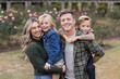 © Jakob Lagerstedt/Stocksy - Portrait of a family standing together