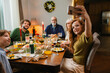 © DZ FILM/Stocksy - Festive family dinner