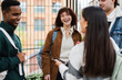 © Nuria Seguí/Stocksy - Female Student With Cheerful Friends At Campus