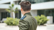 © AndyMtv - A military officer in a formal green or camouflage uniform with neatly styled hair