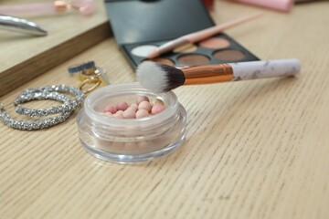 Wall Mural - Makeup room. Different beauty products and jewelry on wooden dressing table, closeup