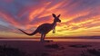 © Сергей Захаров - kangaroo silhouette hopping across horizon during dramatic sunset with bold colors filling sky