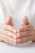 © Юля Бурмистрова - Dry skin on hands revealing a common symptom of hypothyroidism in a close-up view