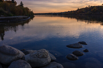Wall Mural - a beautiful lake with a bridge in the background