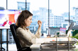 © DC Studio - Woman general director managing multiple expansion projects, showcasing her multitasking abilities, organizational and leadership skills. CEO working with commitment to business success.