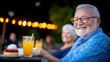 © LifeMedia - Seniors enjoy a delightful afternoon gathering in Houston's backyard