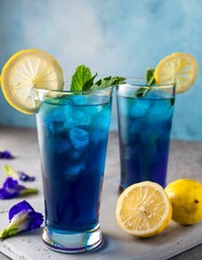 Wall Mural - Refreshing blue iced tea with lemon and mint.