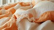 © ifoto - The orange and white striped duvet cover has an embroidered design on the side with ruffles