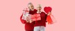 © Pixel-Shot - Happy mature couple with gift boxes and shopping bags on pink background. Valentine's Day celebration