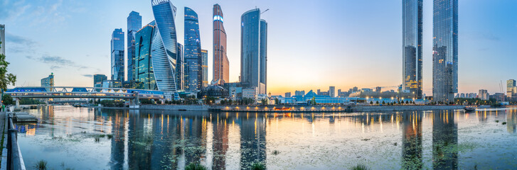 Wall Mural - High buildings of Moscow-City at Moskva River at summer sunset, Russia.