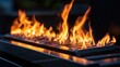 © Seyyar - Flames Dancing on Open Gas Burner Highlighting Modern Culinary Design and Outdoor Cooking Ambiance