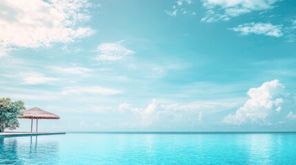 Wall Mural - Serene ocean view with calm water and fluffy clouds under a bright blue sky evoking tranquility and relaxation