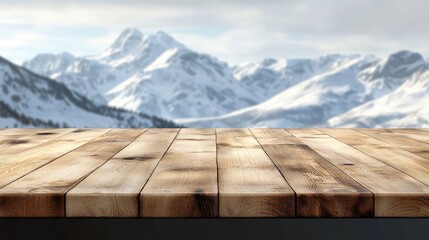 Wall Mural - Scenic Wooden Tabletop with Blurred Snowy Mountain Range in Background Ideal for Product Display or Nature-Themed Promotions