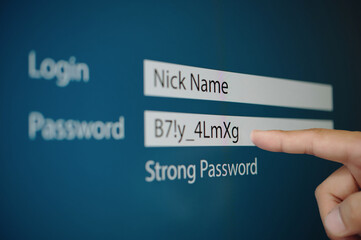 close-up of user entering password on computer