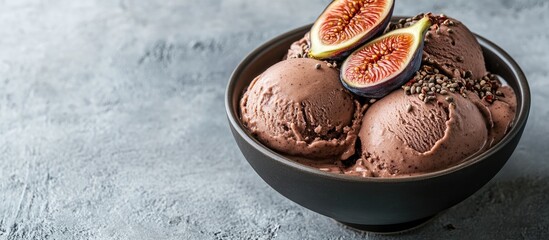 Poster - Chocolate smoothie bowl or vegan ice cream topped with figs and hemp seeds set against a gray background. with copy space image. Place for adding text or design