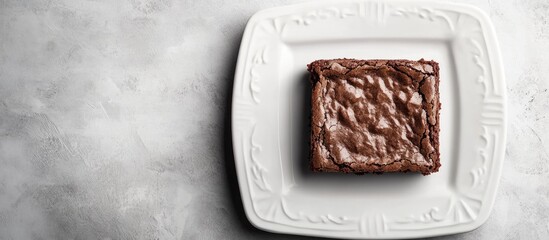 Aufkleber - homemade almond brownie on a white dish. with copy space image. Place for adding text or design