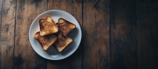 Fototapete - Plate featuring inventive sweet toasts on a wooden table. with copy space image. Place for adding text or design