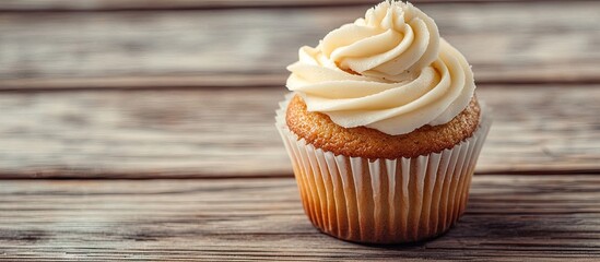 Aufkleber - Homemade vanilla cupcakes on a wooden surface Breakfast. with copy space image. Place for adding text or design