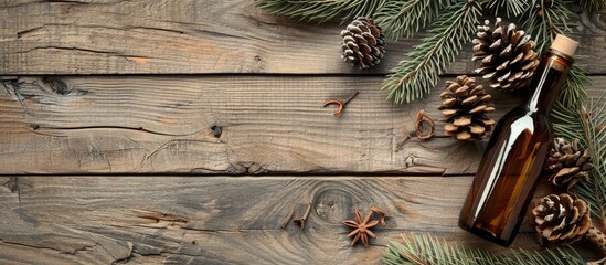 Fototapete - Christmas background on aged wooden boards featuring a decorative element shaped like a figure eight an antique bottle and larch cones. with copy space image. Place for adding text or design