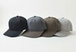 © Anarkali Art - A row of five neutral colored snapback caps arranged in a minimalist style on a clean flat surface