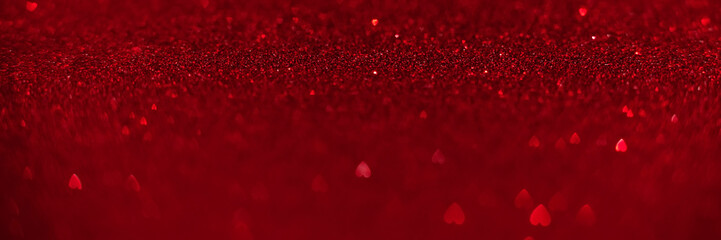 Wall Mural - Red hearts, sparkling glitter bokeh background banner, valentines day abstract defocused texture header