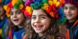 © Evon J - Group of young caucasian girls smiling in colorful rainbow costumes at a festive event