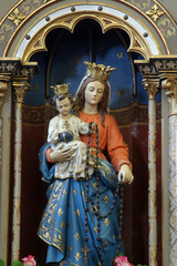 Wall Mural - Virgin Mary with baby Jesus, statue on the altar of Our Lady in the parish church of Saint John of Nepomuk in Stupnik, Croatia