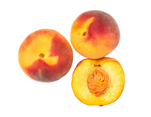 Wall Mural - Two whole peaches and a peach half with seed showing on transparent background