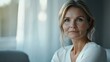 © SSTC AI Photo&Video - Confident Gaze: A portrait of a mature woman, radiating confidence and serenity. Her thoughtful expression and direct gaze convey strength and composure. 