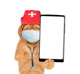 Poster - Smart Mastiff puppy wearing like a doctor with stethoscope on his neck showing big smartphone with white blank screen in it paw. isolated on white background