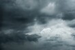 © BESTIMAGE - dark clouds make sky in black. Heavy rain thunderstorm. Pattern of clouds overcast predict tornado, Hurricane or thunderstorm and rainy. Dark sky cloudy have storm and lightning thunderbolt.
