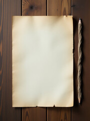 Wall Mural - a worn sheet of paper sits on a wooden table next to a pencil made from a twisted tree branch. 00001