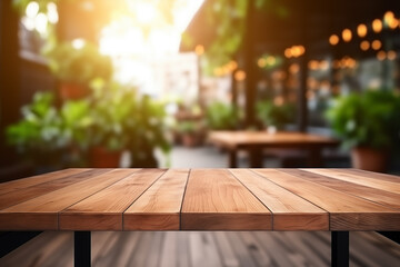 Wall Mural - Empty wooden table in front of abstract blurred spring or summer background for product display in a coffee shop, local market or bar