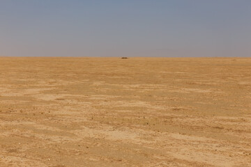 vast arid landscape in kunduz province afghanistan showcasing dry terrain and distant horizon