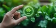 © Pixelbiz - AI trend 2025 business concept. A hand reaches for a green leaf icon, symbolizing growth and sustainability, surrounded by lush greenery.
