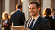 © PixelPulse AI - a portrait of a smiling businessman using a tablet, surrounded by colleagues. He is dressed in a dark suit and tie