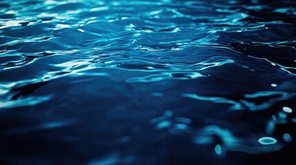 Wall Mural - abstract blue water surface with dynamic light reflections creating a serene aquatic background suit