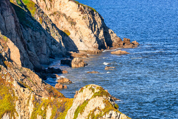 Wall Mural - Breathtaking aerial view of Point Reyes, California, showcasing dramatic coastal cliffs surrounded by the Pacific Ocean. A stunning destination for nature lovers, photographers, and outdoor