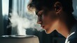 © mirifadapt - man using a facial steamer, leaning over the device, letting the steam open their pores