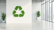 © olga_demina - Large green recycle symbol displayed on a white wall in a modern office space with large windows and potted plants, promoting sustainability and waste management