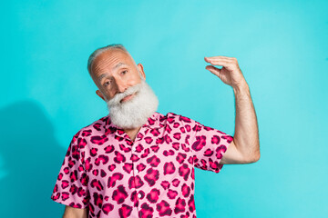 Wall Mural - Portrait of funky aged man arm mocking chatterbox wear leopard print costume isolated on turquoise color background