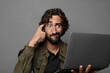© kues1 - young bearded man using a laptop