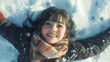 © bephoto - 雪に天使の形を作り楽しむ日本人の女の子の笑顔